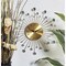 Gold Metal Glam Wall Clock, 15" x 0.5" x 15", Starburst Design